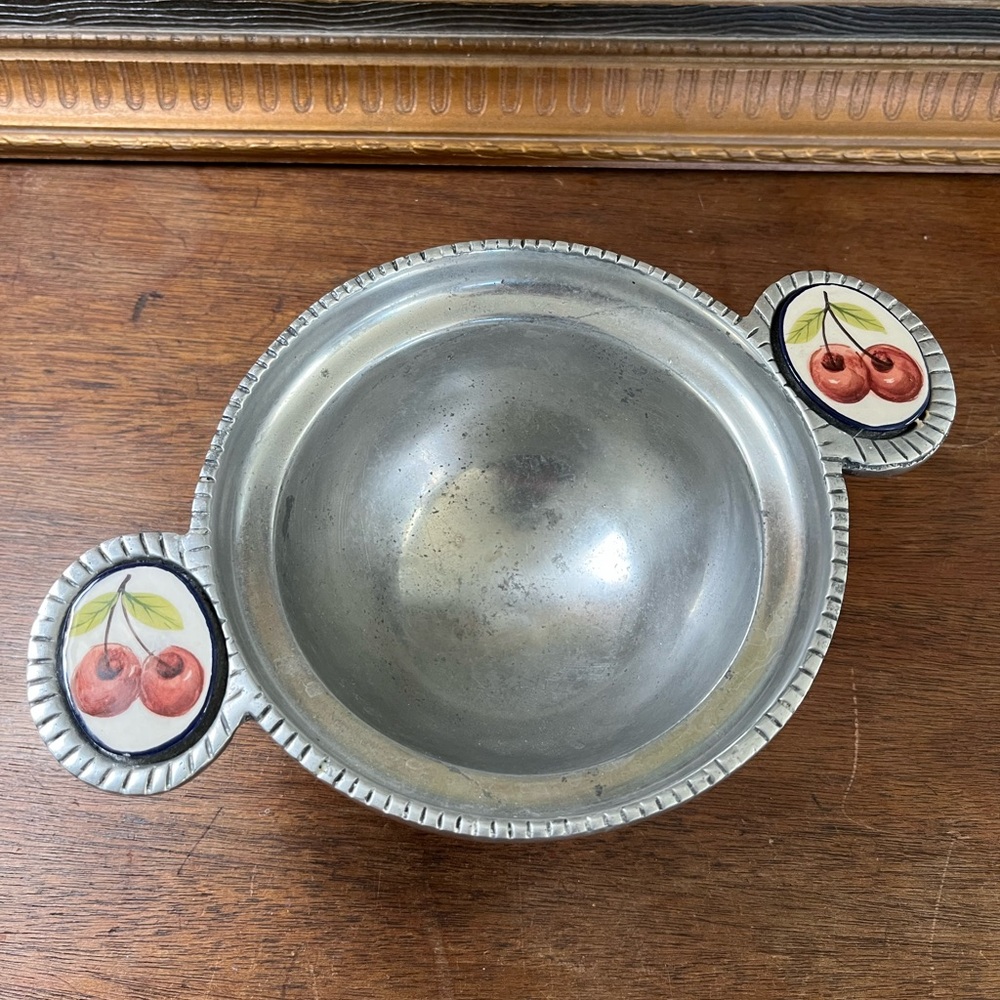 Vintage pewter serving bowl with handles, cherry porcelain details